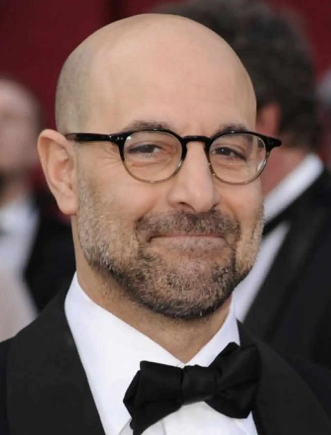 Stanley Tucci comme Caesar Flickerman